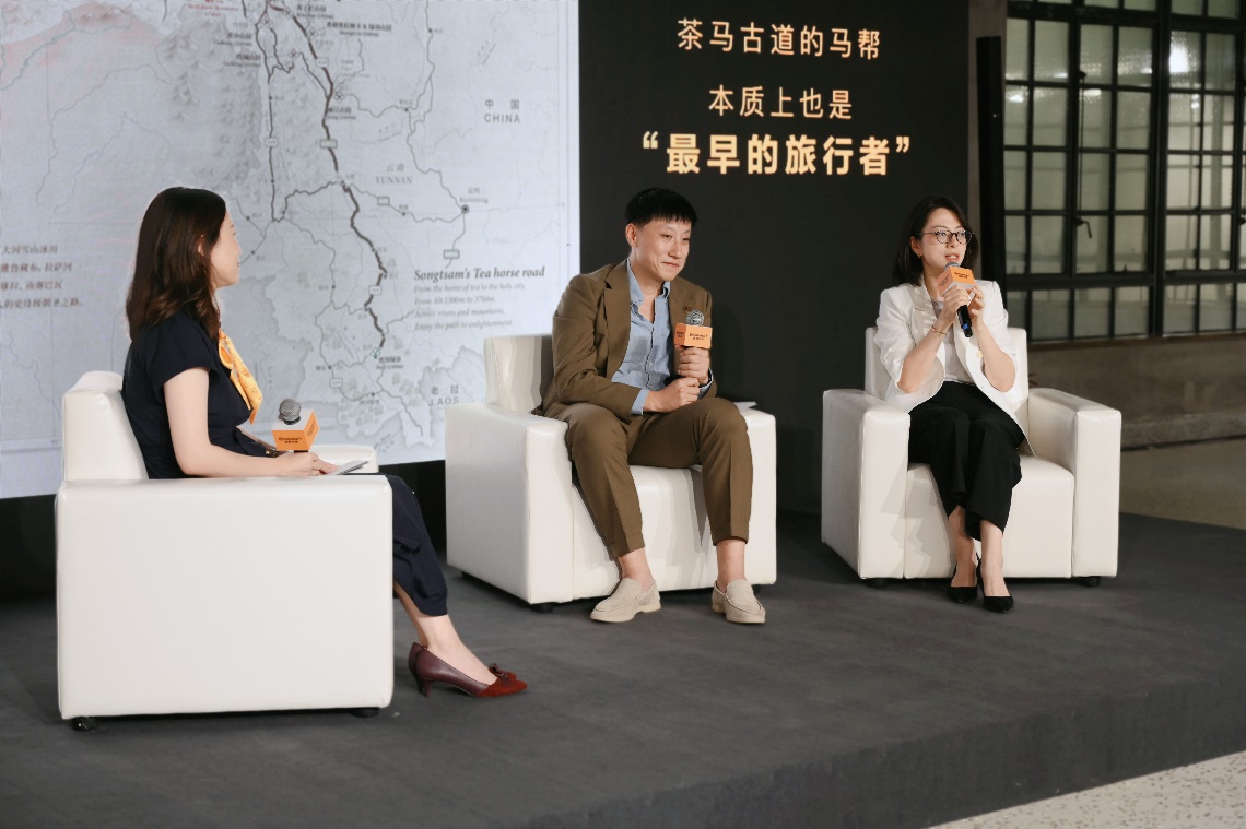 A group of people sitting on a stageAI-generated content may be incorrect.