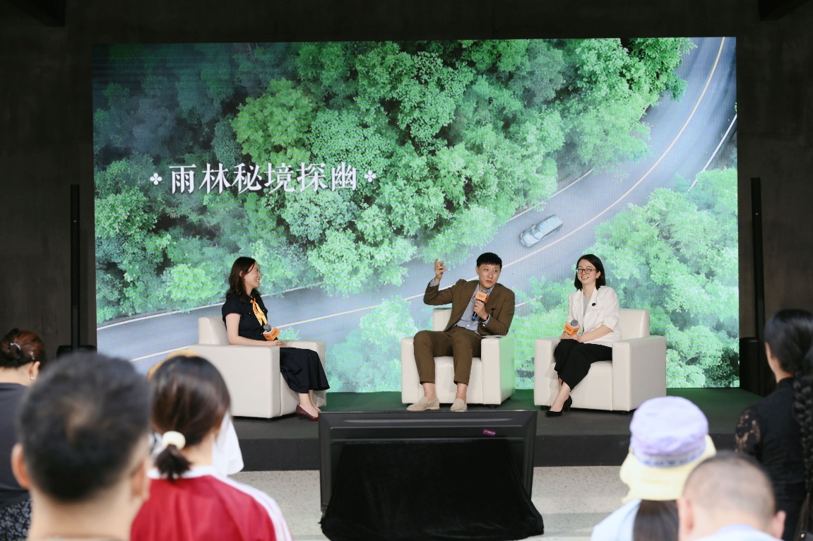 A group of people sitting on a stageAI-generated content may be incorrect.